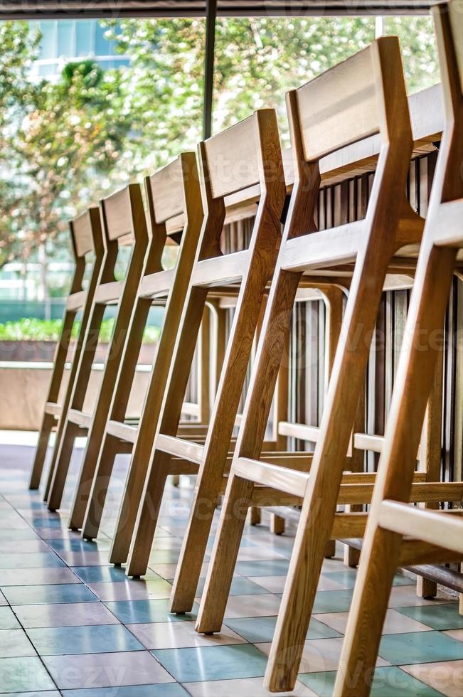 bar stools or benches, with thick pasta floor, at the back vegetation, bar and counter bar. photo