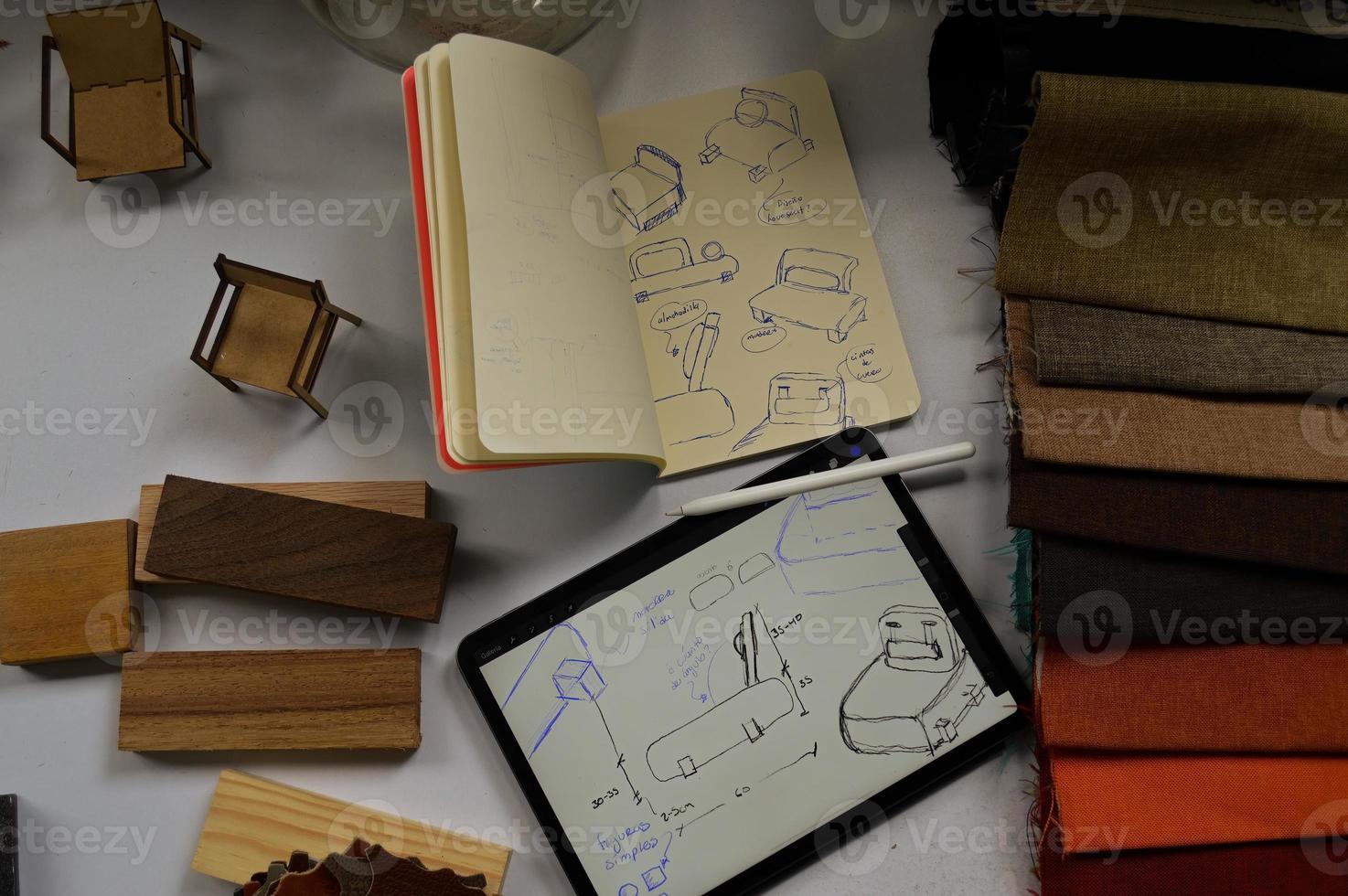 furniture design, digital drawing in tablet and analog in notebook photo