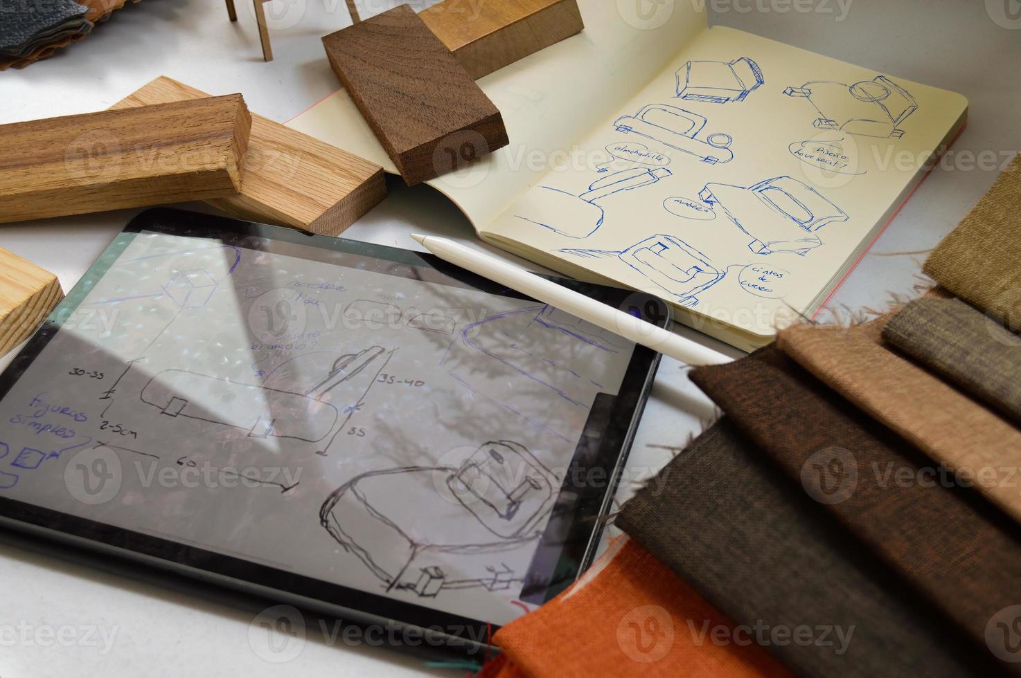 furniture design, digital drawing in tablet and analog in notebook photo