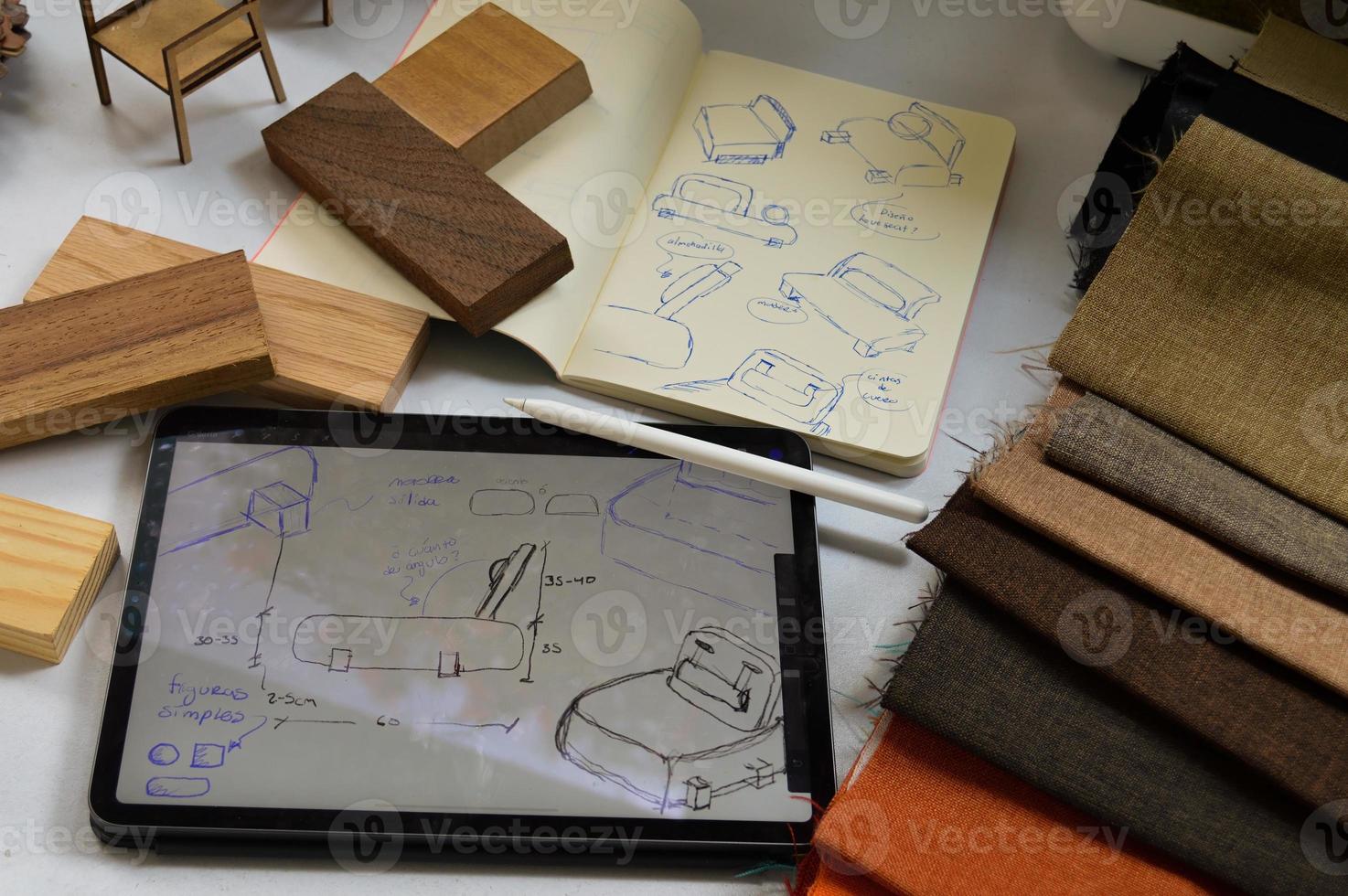 furniture design, digital drawing in tablet and analog in notebook photo
