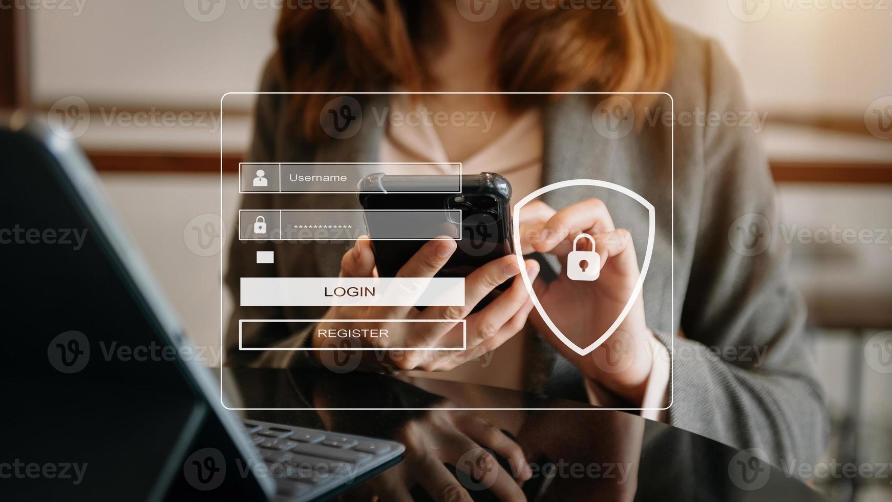 Cyber security concept, Login, User, identification information security and encryption, secure access to user's personal information woman using smart phone and tablet in office photo