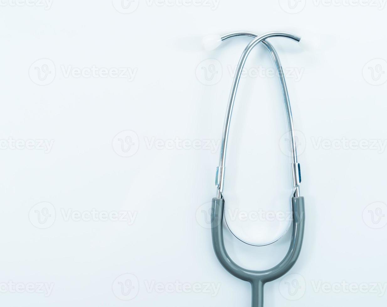 Stethoscope for doctor checkup on table photo
