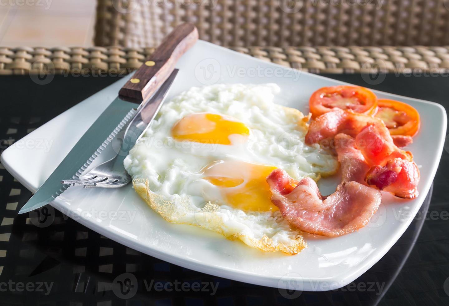 Breakfast with egg and bacon photo