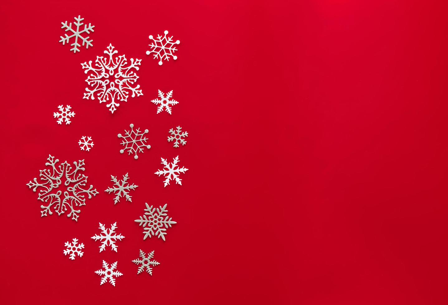 Snow red background. Background with snowflake, Christmas celebration concept. Flat lay photo