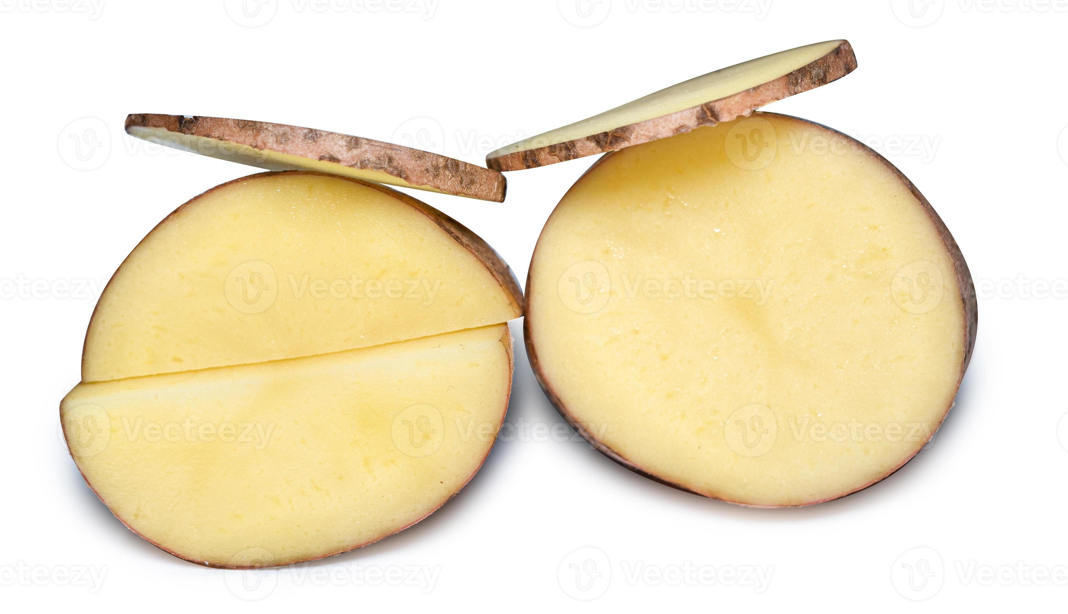 Isolated potatoes. Cut raw potato vegetables isolated on white background with clipping path