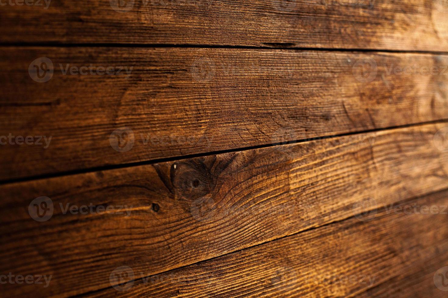 textura de fondo de madera de color vintage con nudos y agujeros de clavos. antigua pared de madera pintada. tableros horizontales oscuros de madera. vista frontal con espacio de copia. foto