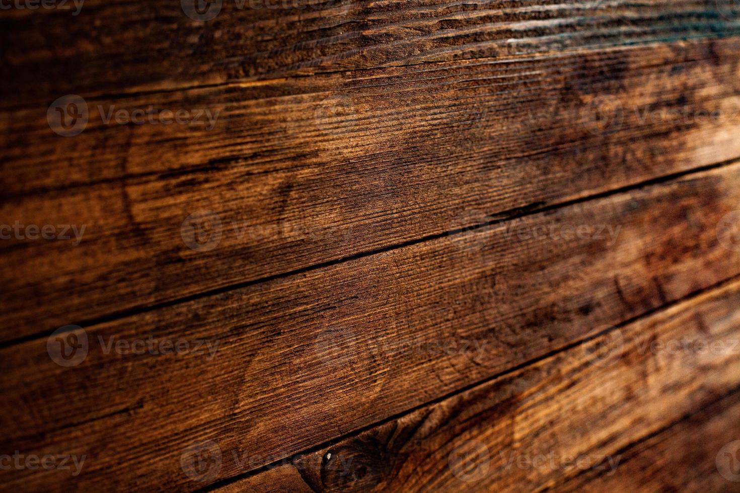 Vintage colored wood background texture with knots and nail holes. Old painted wood wall. Wooden dark horizontal boards. Front view with copy space. photo