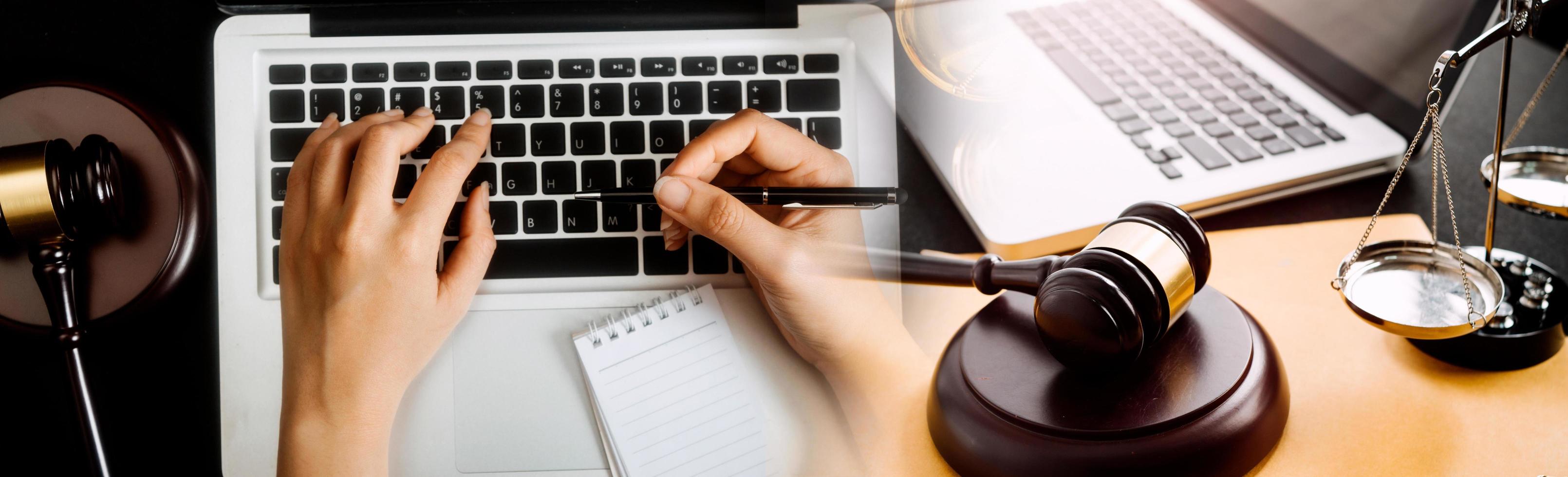 Business and lawyers discussing contract papers with brass scale on desk in office. Law, legal services, advice, justice and law concept picture with film grain effect photo