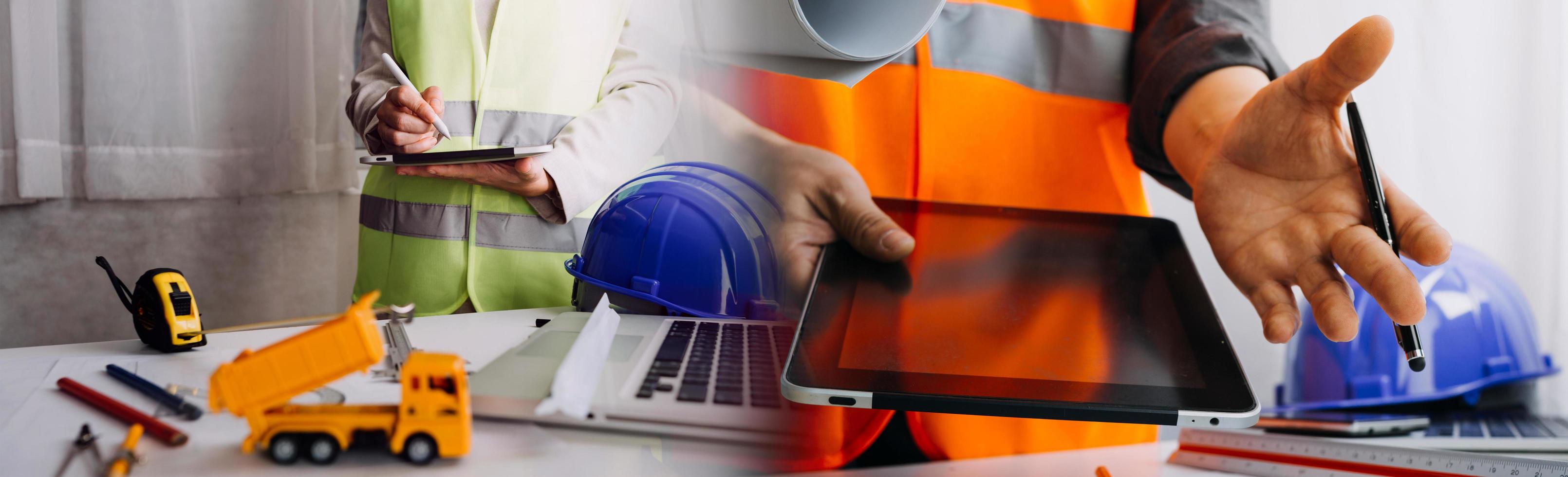 Two colleagues discussing data working and tablet, laptop with on on architectural project at construction site at desk in office photo