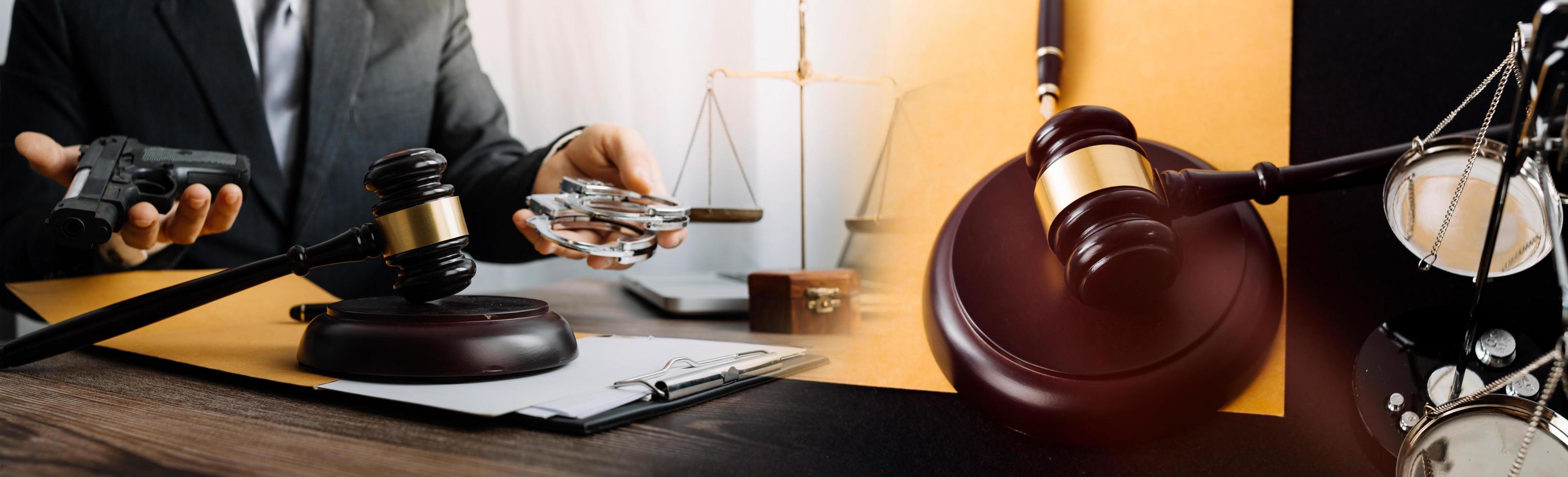 Business and lawyers discussing contract papers with brass scale on desk in office. Law, legal services, advice, justice and law concept picture with film grain effect photo