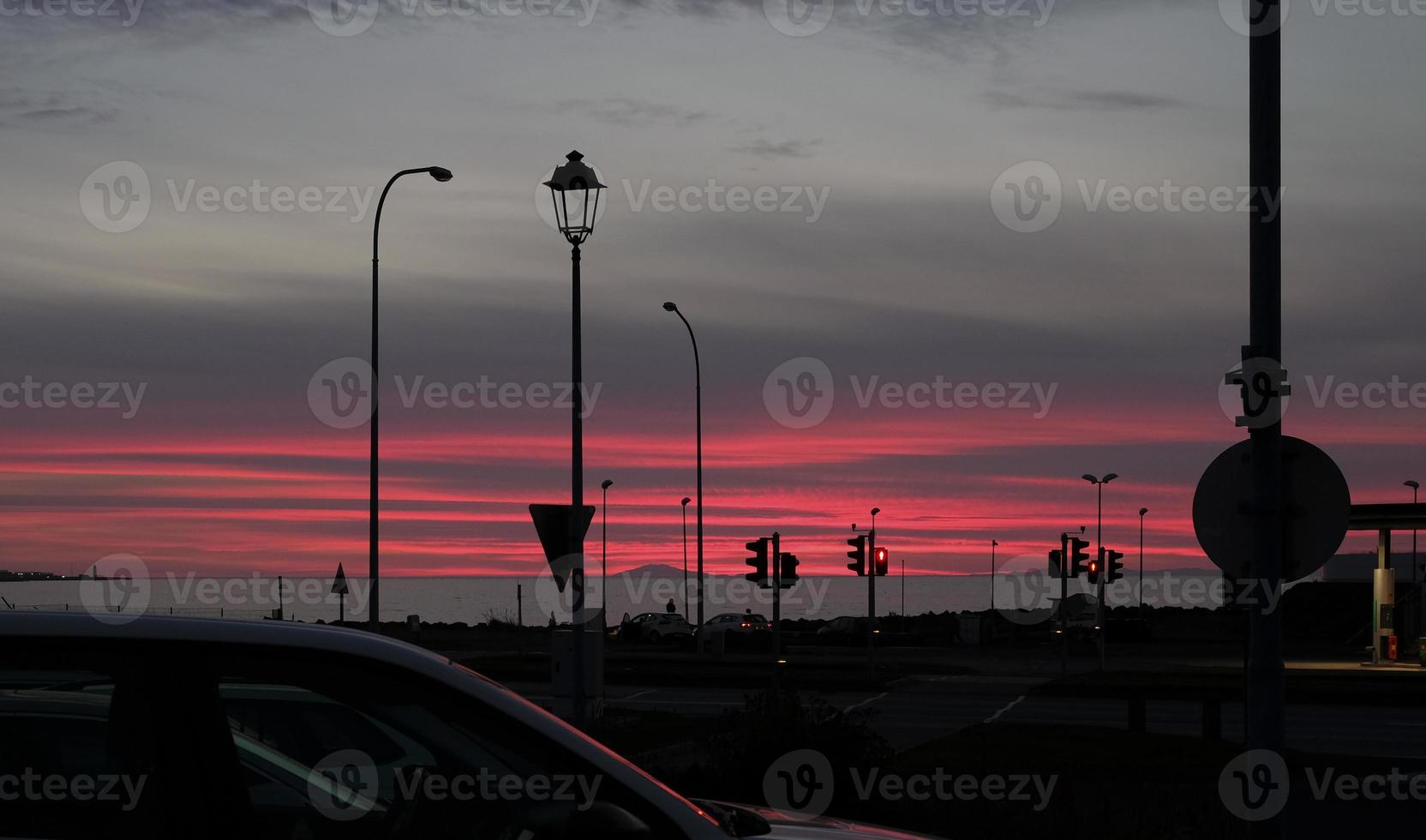 Intense sunset at the coast of Reykjavik, Iceland photo