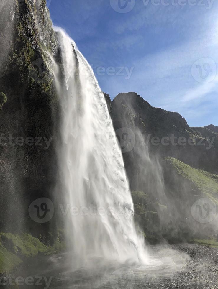 Seljalandsfoss waterfall on the southern coast of Iceland on a sunny day photo