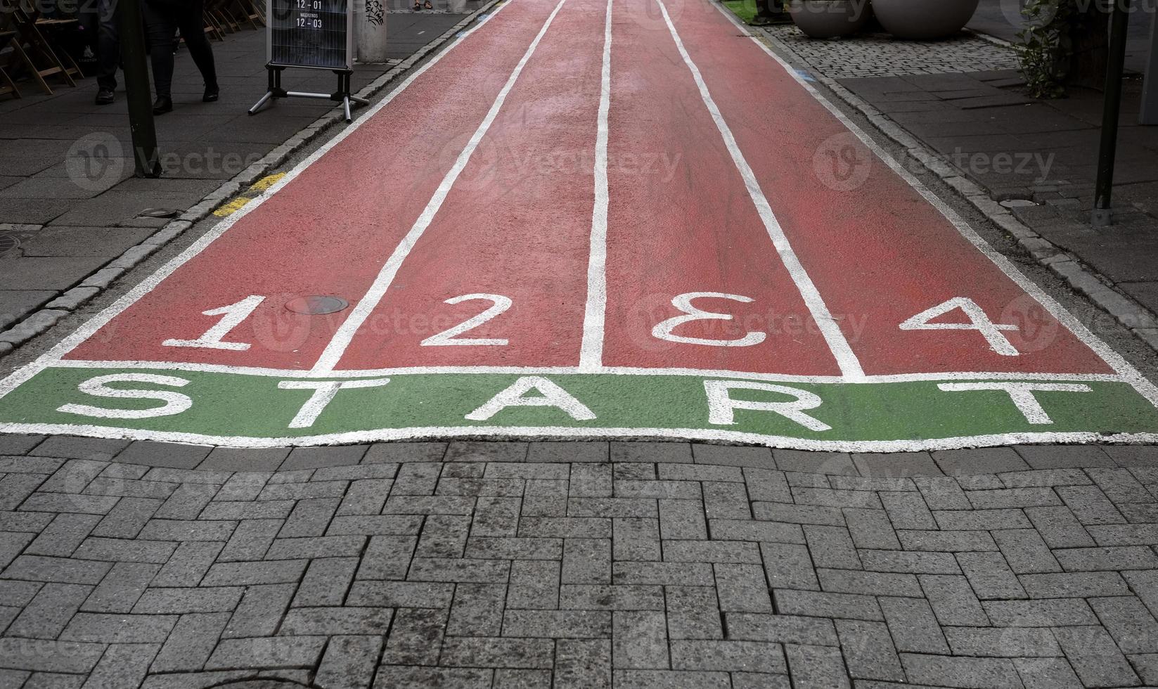 Running lanes painted onto the floor in a pedestrian zone photo