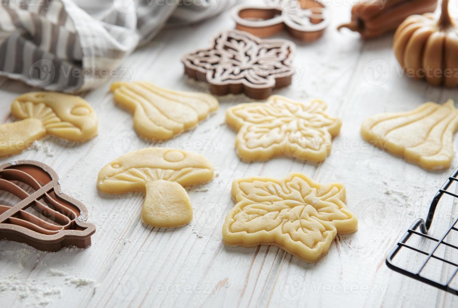 Baking cookies in the form of pumpkin and leaves photo