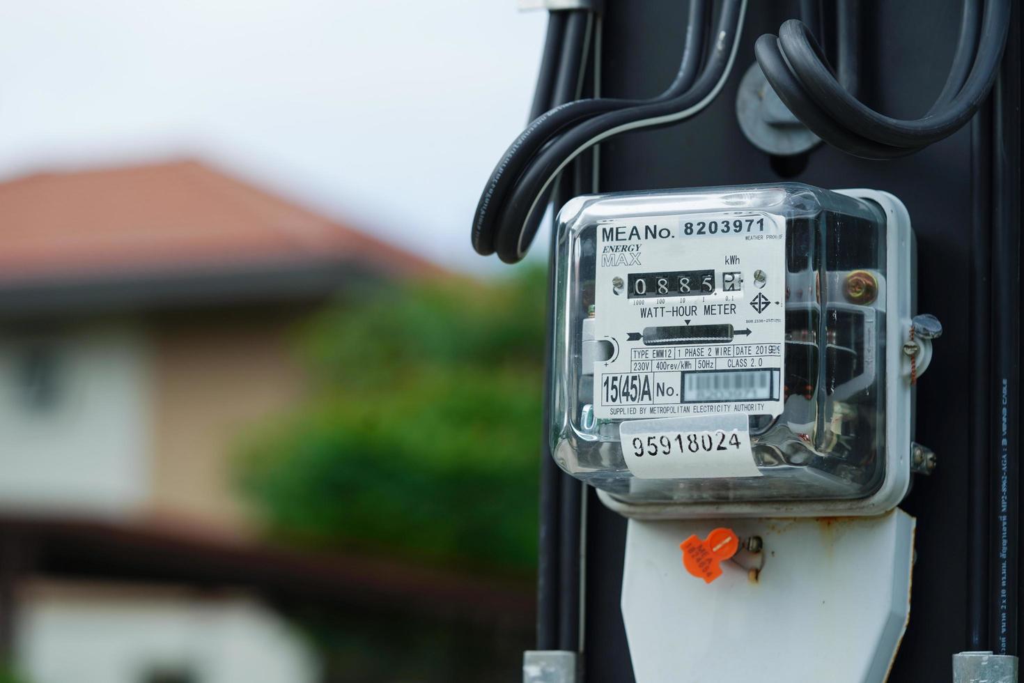 Bangkok, Thailand - May 15, 2022 Electric measuring power meter for energy cost at home and office. photo