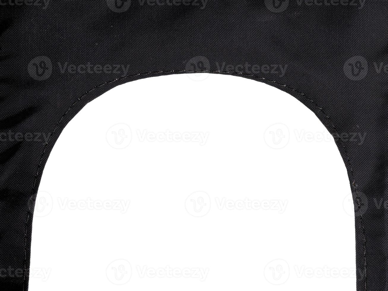 Black synthetic fabric archway with seam isolated on white photo