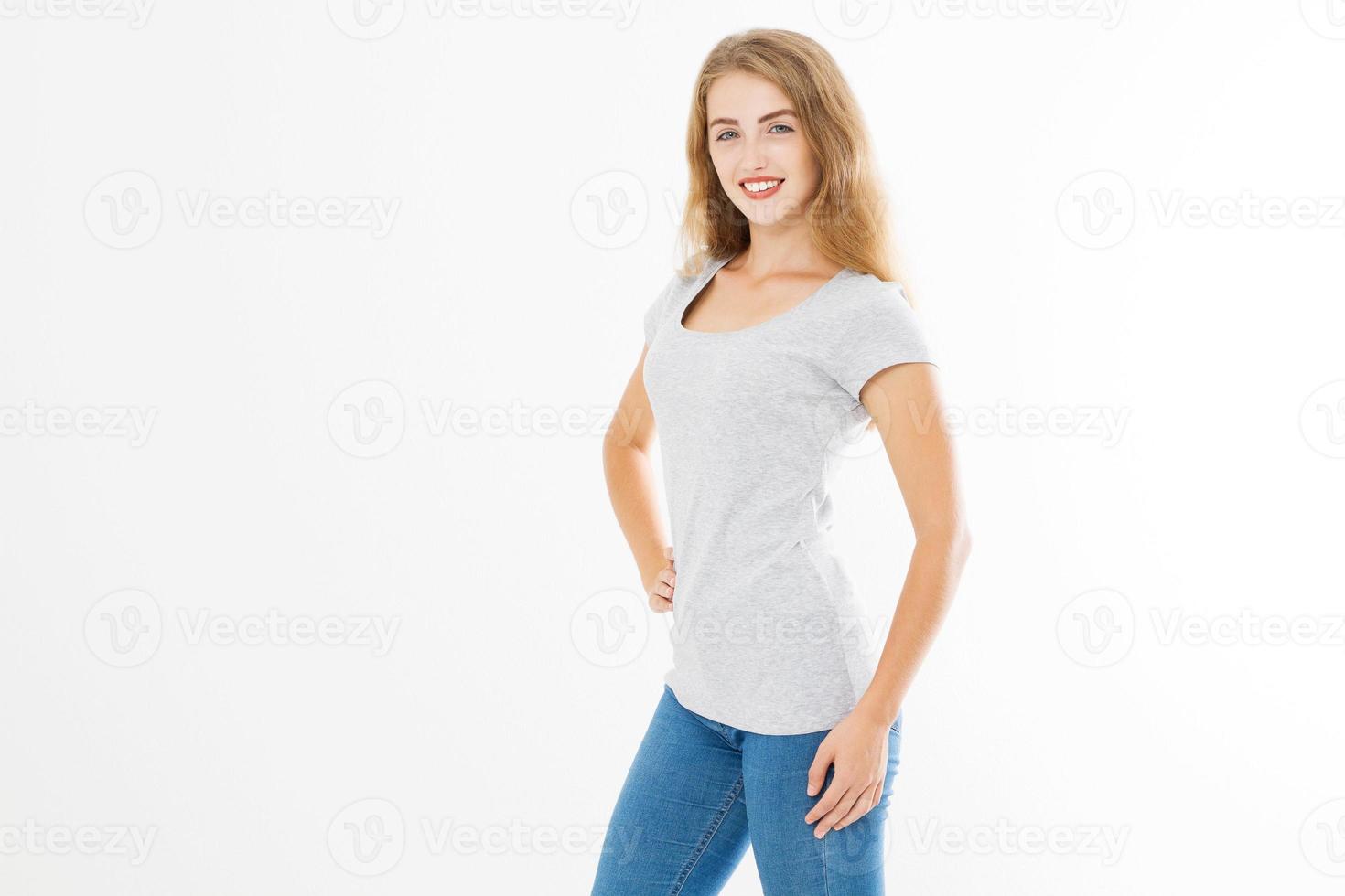 Young blonde woman with fit slim body in blank template t shirt and jeans isolated on white background. Skin and hair care. Copy space and mock up photo