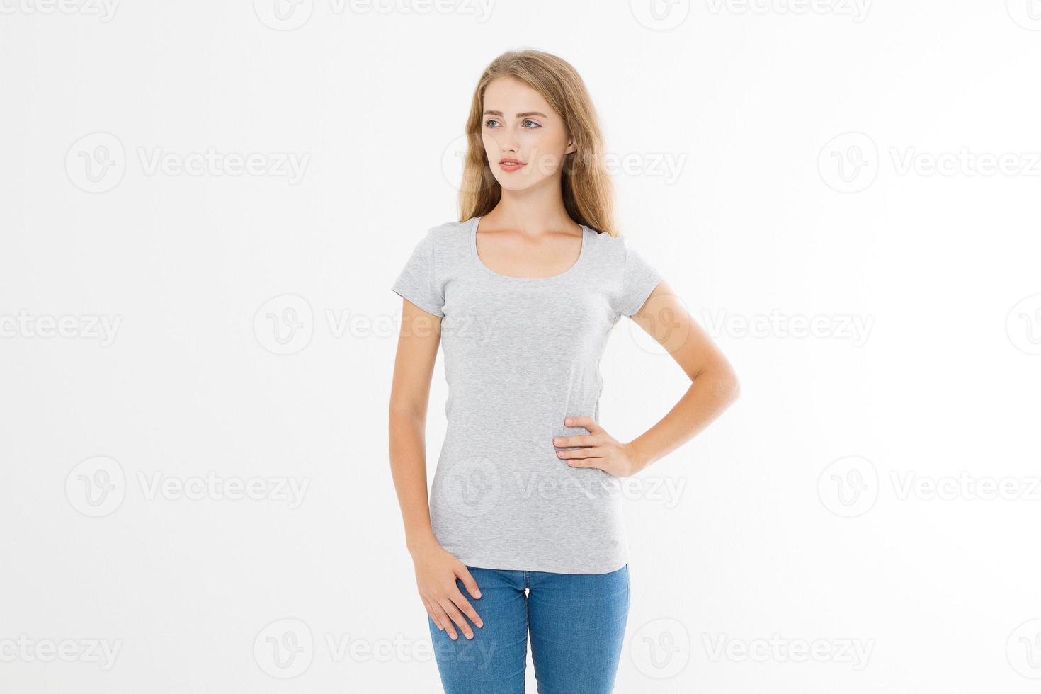 Young blonde woman with fit slim body in blank template t shirt and jeans isolated on white background. Skin and hair care. Copy space and mock up photo