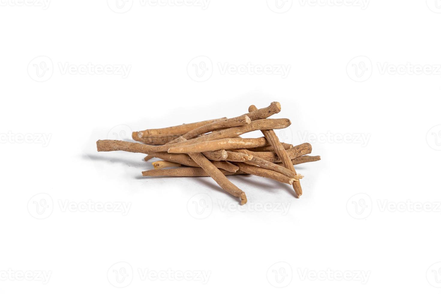 Aswagandha root or Withania somniferaand  isolated on white background Alternative medicine photo