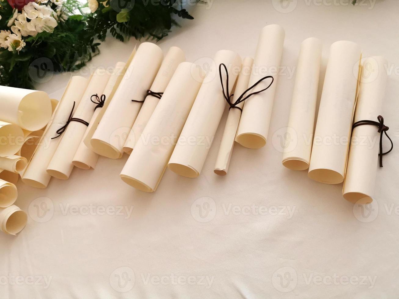 Parchment scroll vellum on a table photo