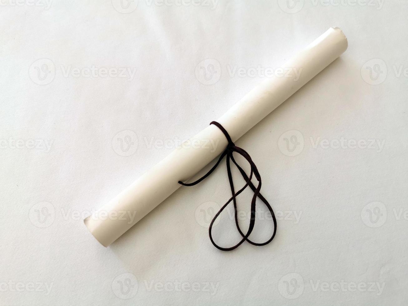 Parchment scroll vellum on a table photo