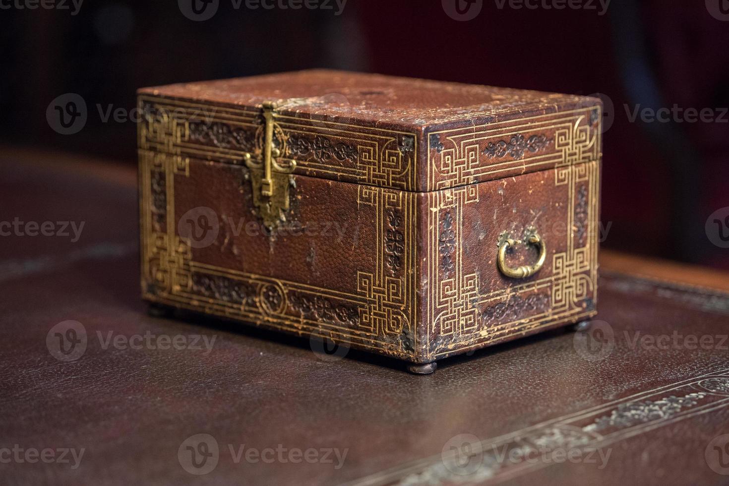 old ancient secret casket on a desk photo