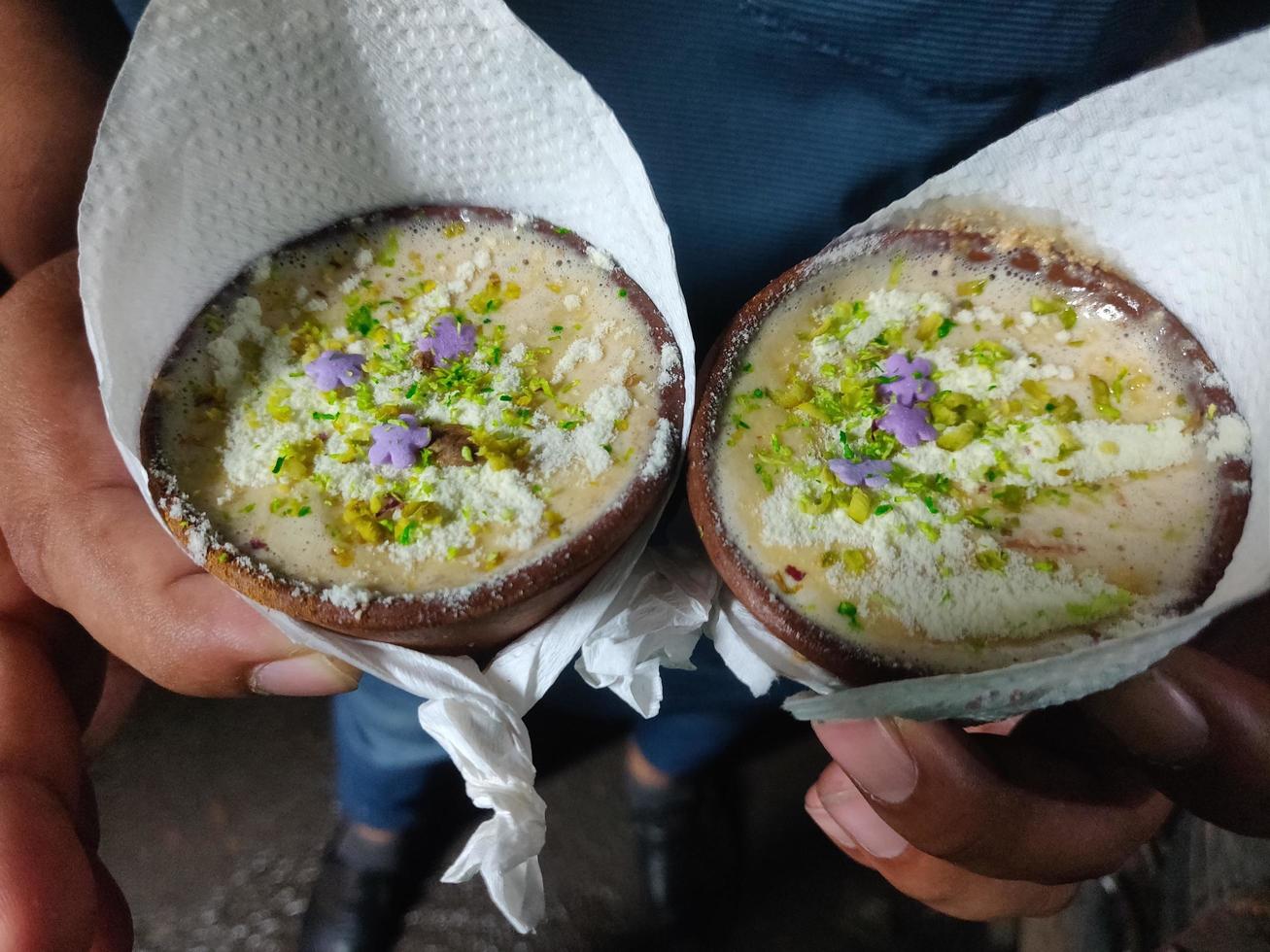 Malai cha, chai or masala chai in a clay cup, street food photo