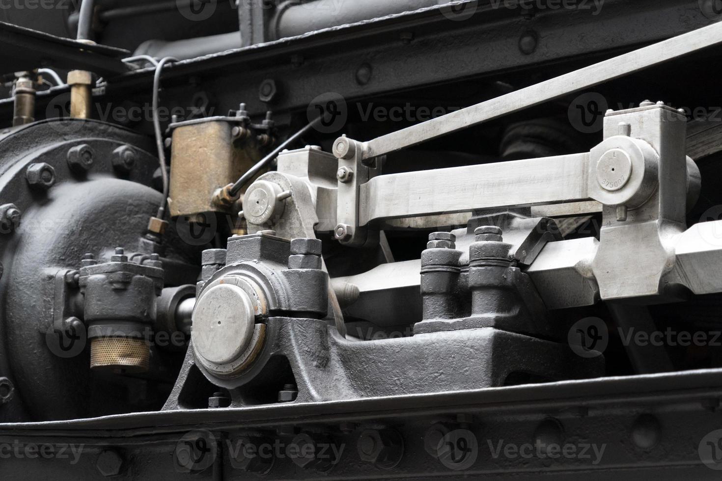 old steam train wheels detail photo