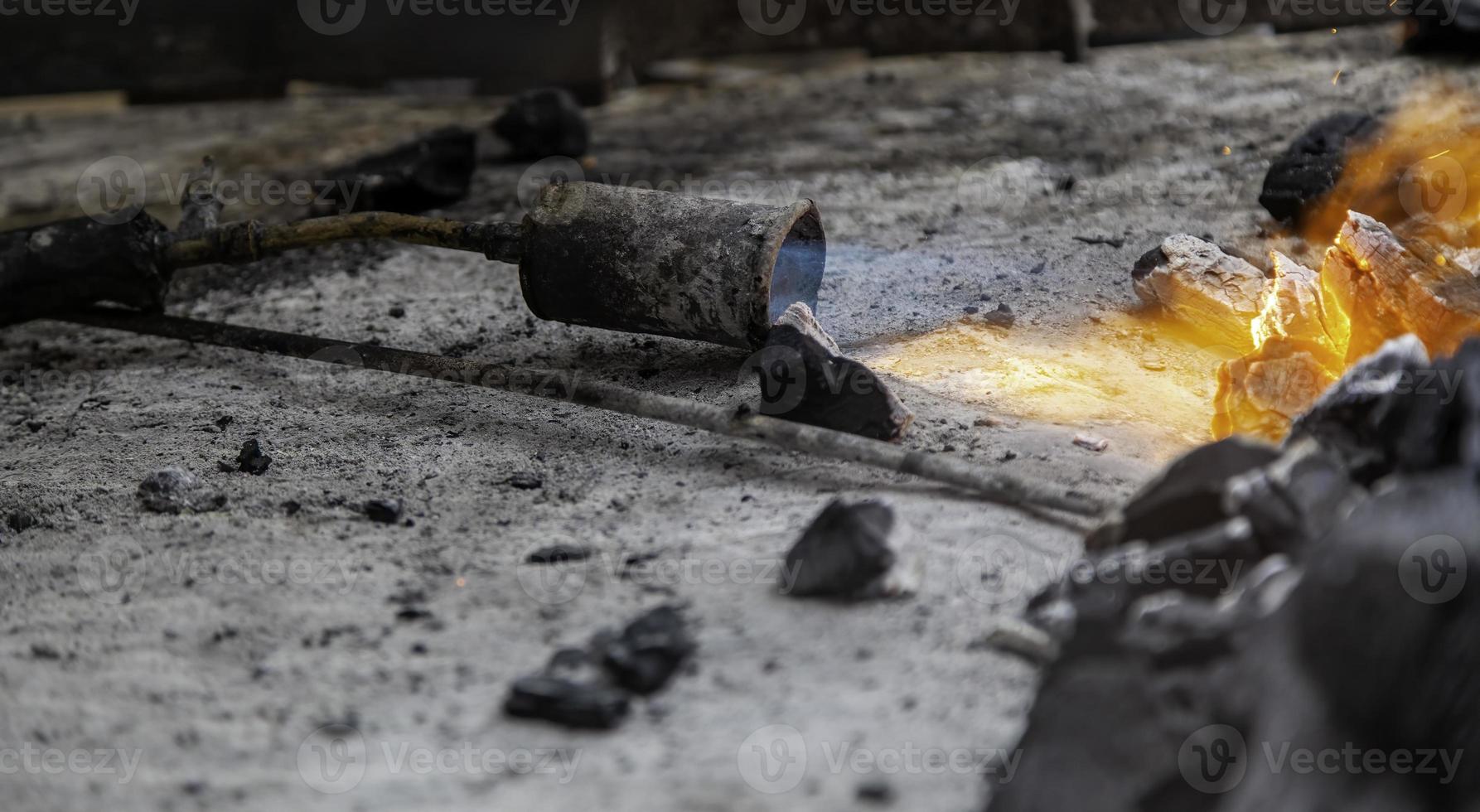 Torch lighting coal 12192523 Stock Photo at Vecteezy