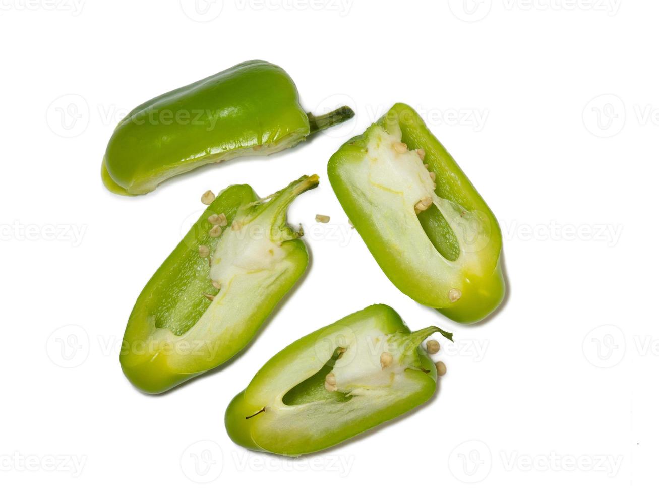 Sliced dolma pepper on a white background. A juicy beautiful vegetable. Green sweet pepper. photo