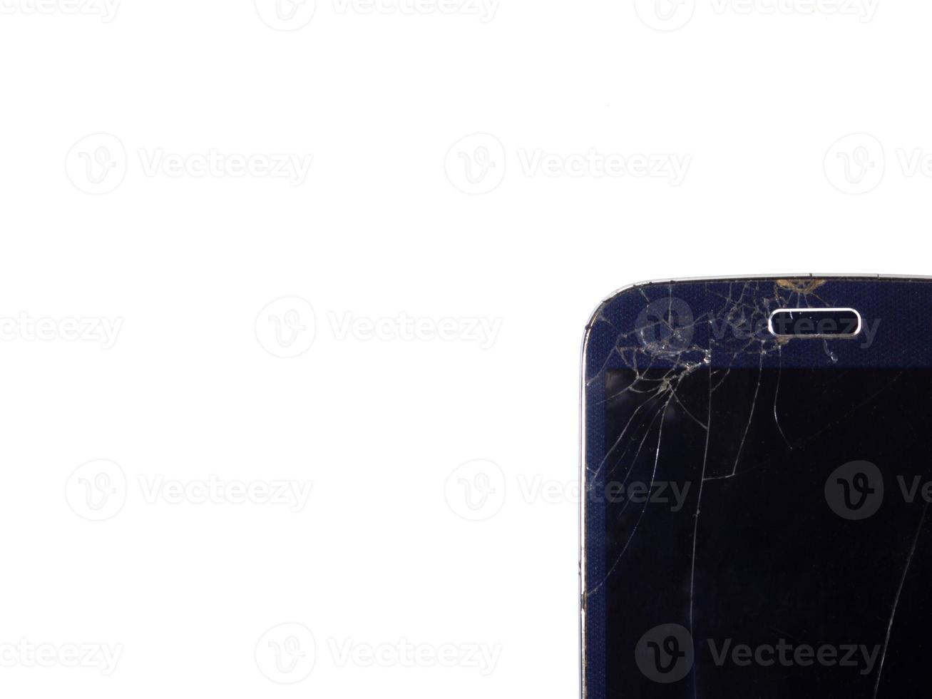 Part of the phone. Broken screen. Cracks in the screen. photo