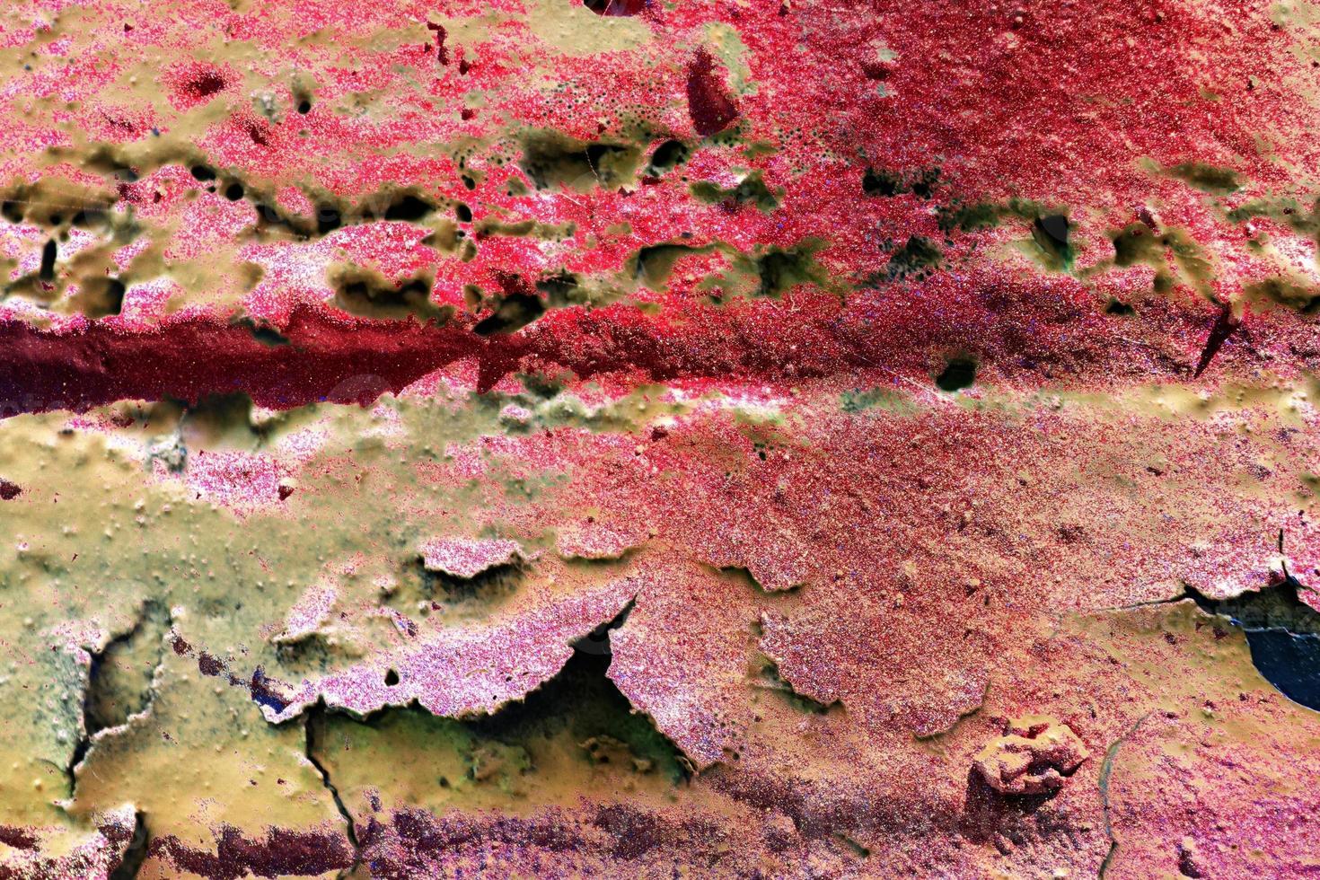 Texture of colorful graffiti paint on conrete and brick walls in red blue purple and silver photo