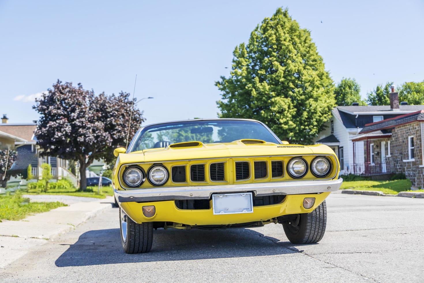 Vintage yellow old car on a street photo