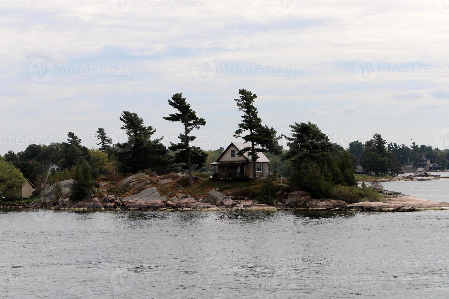 The Thousand Islands is an archipelago of islands that stretch along the border of Canada and the United States along the St. Lawrence River. photo