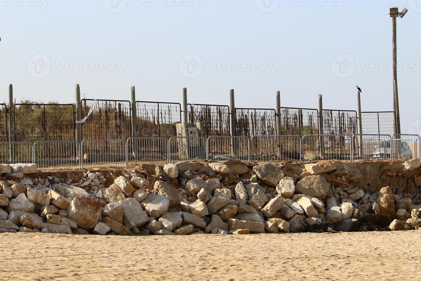 Fence in the city park on the shores of the Mediterranean Sea. photo