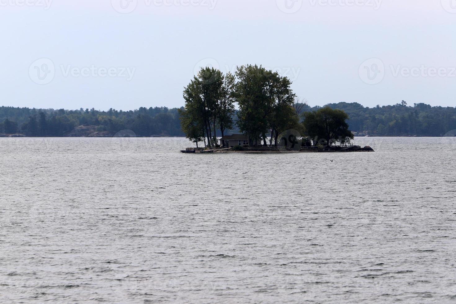 The Thousand Islands is an archipelago of islands that stretch along the border of Canada and the United States along the St. Lawrence River. photo