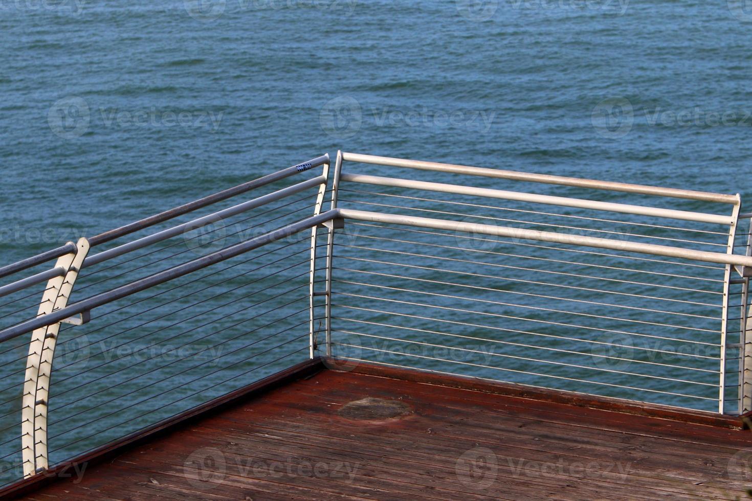Fence in the city park on the shores of the Mediterranean Sea. photo