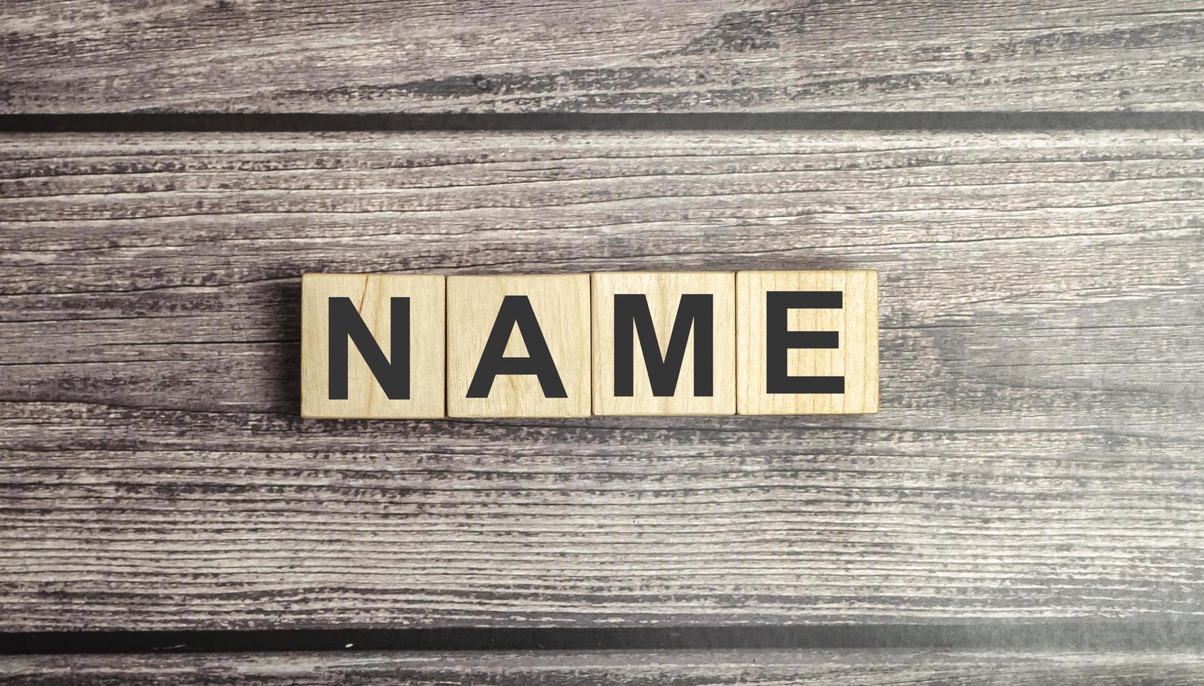 Word NAME made with wood building blocks photo