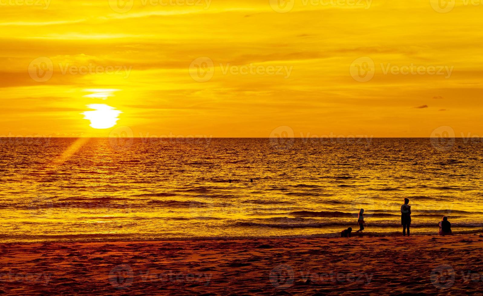 Beautiful stunning colorful and golden sunset at Phuket island Thailand. photo