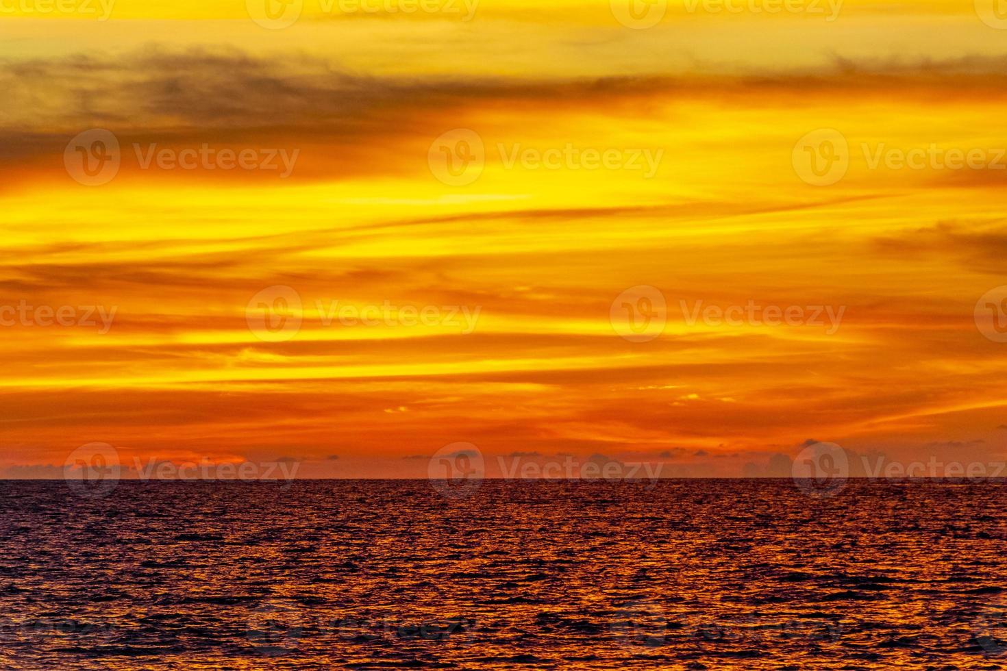 Beautiful stunning colorful and golden sunset at Phuket island Thailand. photo