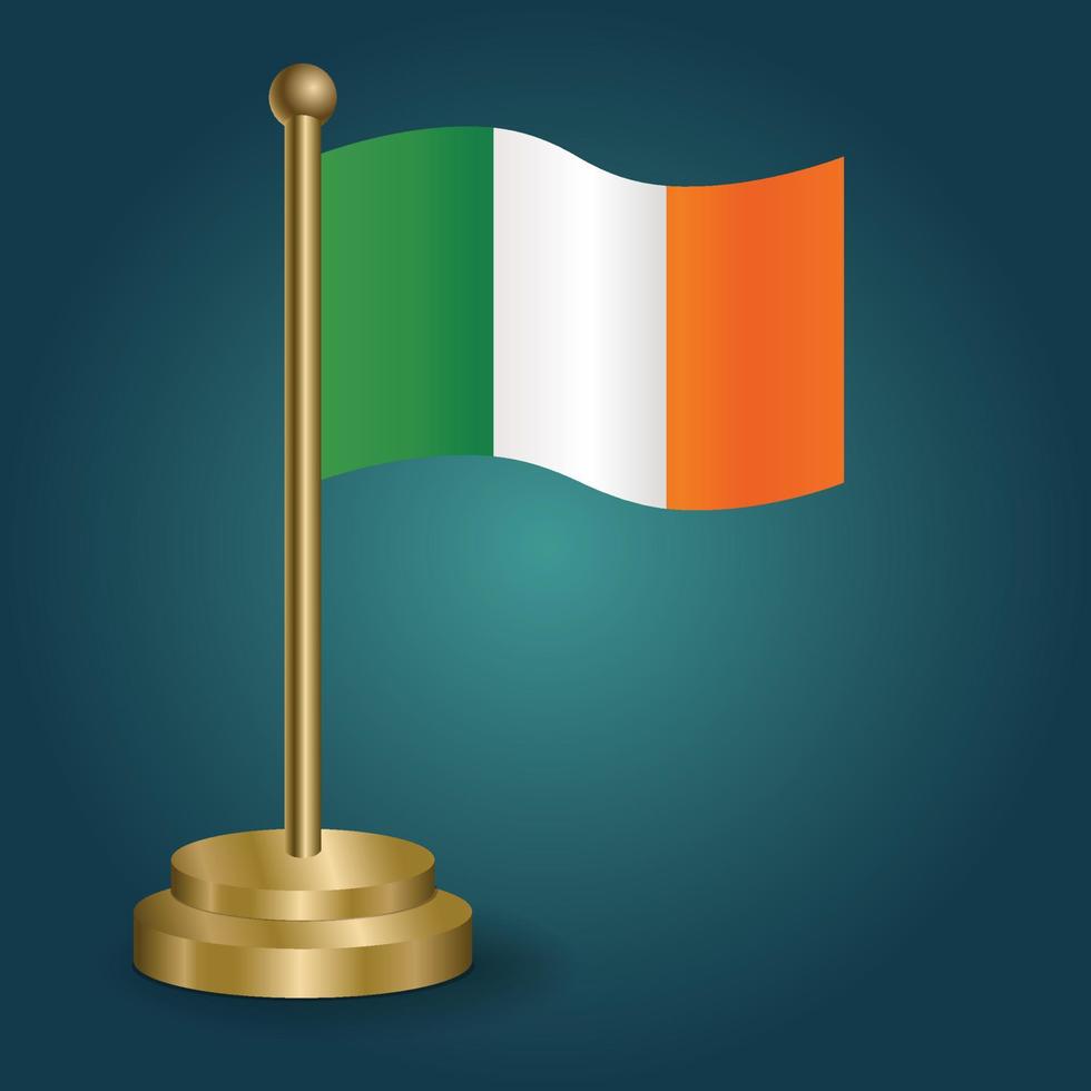 bandera nacional de irlanda en el poste dorado sobre fondo oscuro aislado de gradación. bandera de mesa, ilustración vectorial vector