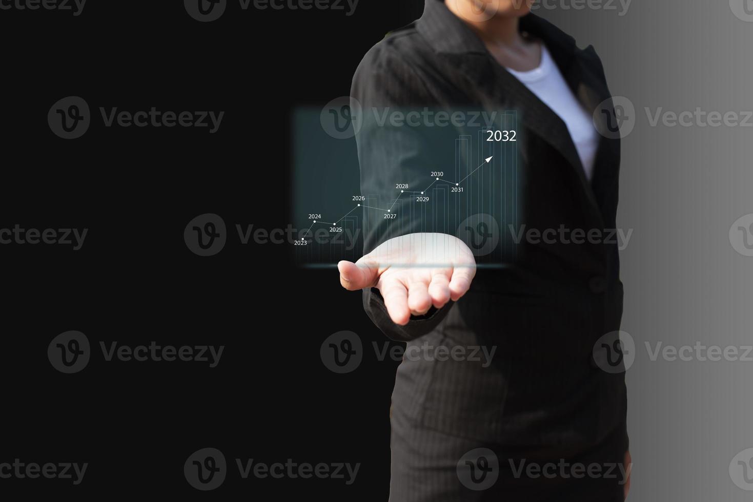 Businesswoman Drawing Add Graph Arrow Organization Future Growth Year 2023 to 2032 New Goals, Plans and Vision for Next Year 2023. photo