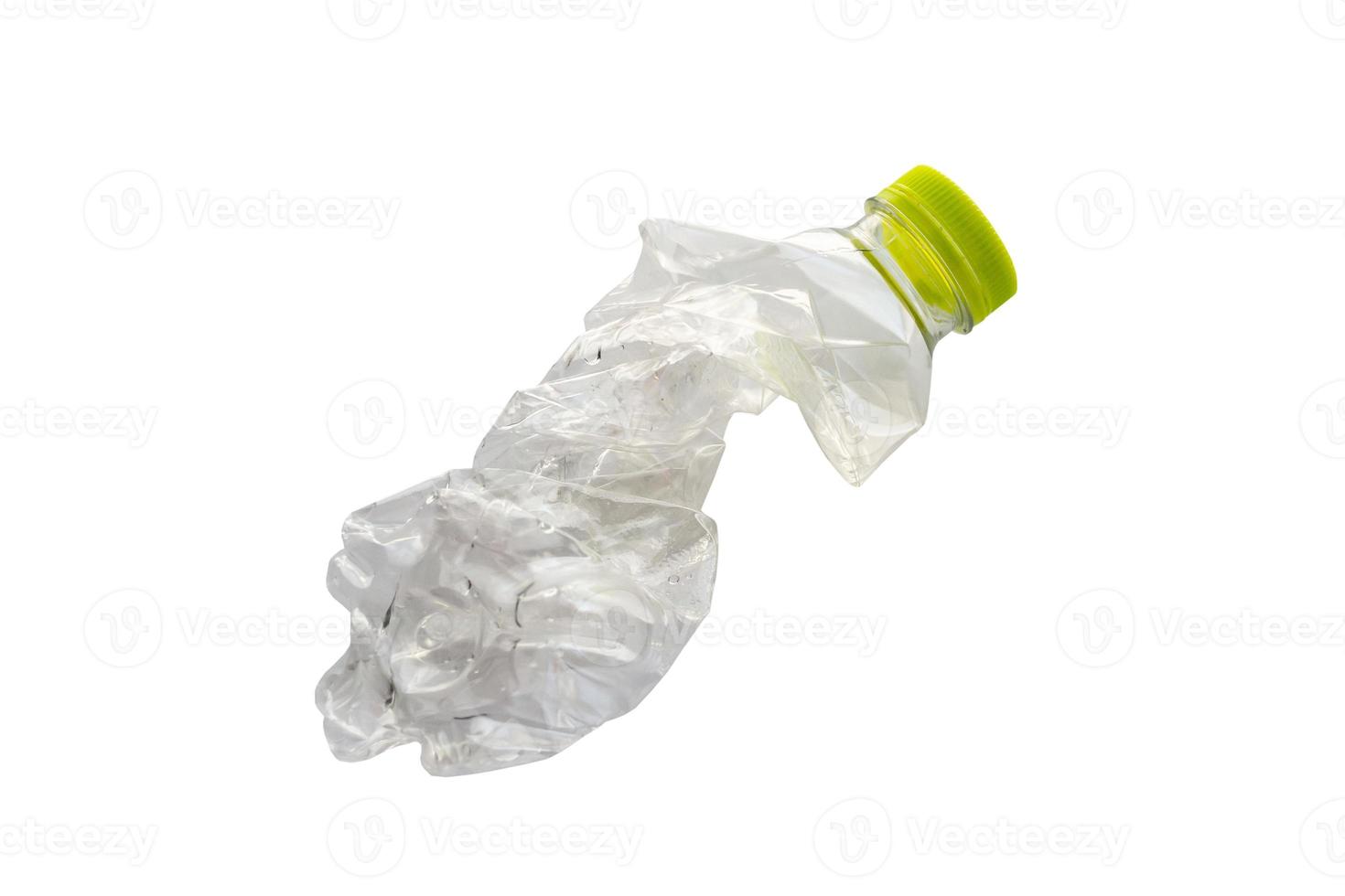 Crushed plastic bottle isolated on white background with clipping path photo