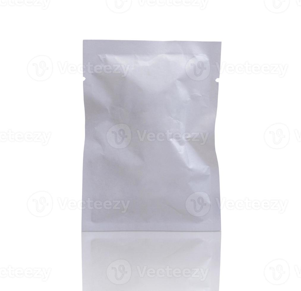 blank white packaging paper sachet isolated on white background with clipping path photo