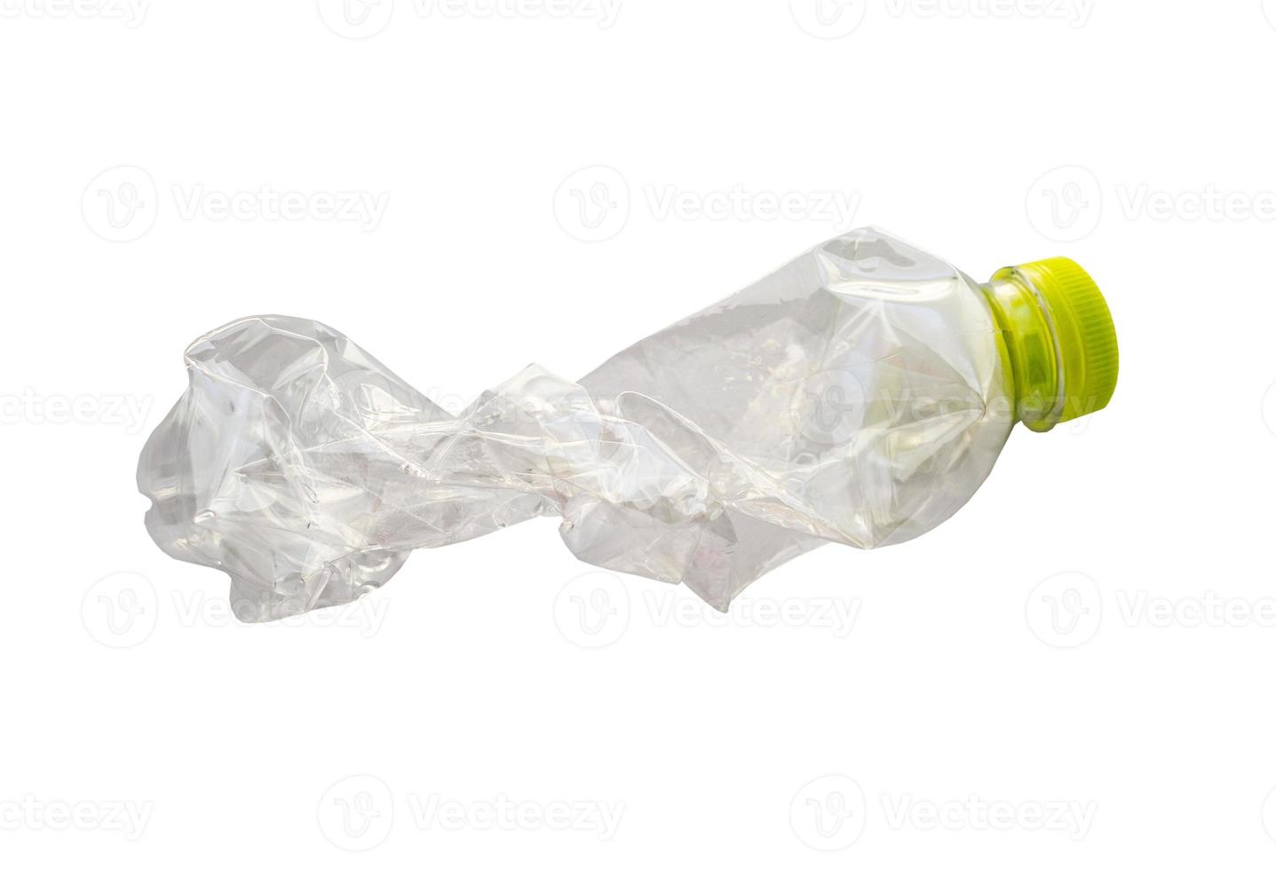Crushed plastic bottle isolated on white background with clipping path photo