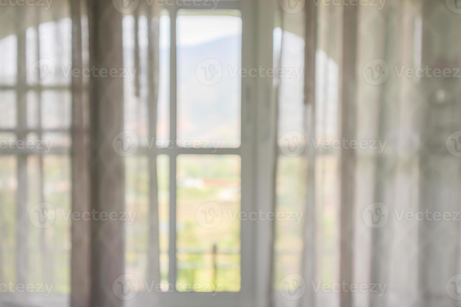 window curtain with green garden abstract blur background photo