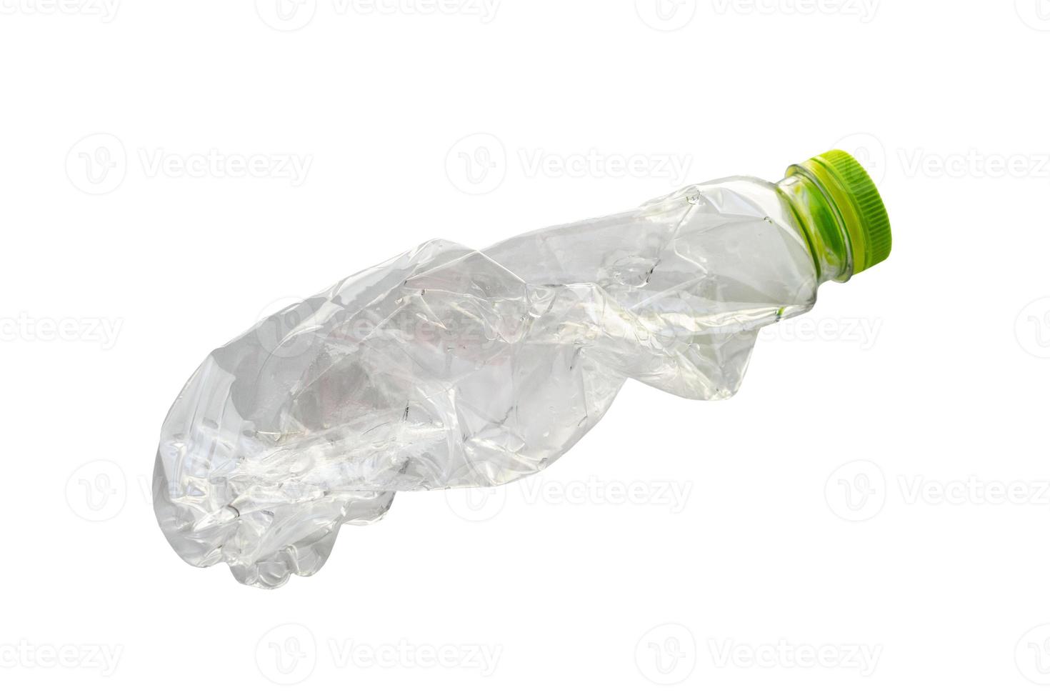 Crushed plastic bottle isolated on white background with clipping path photo