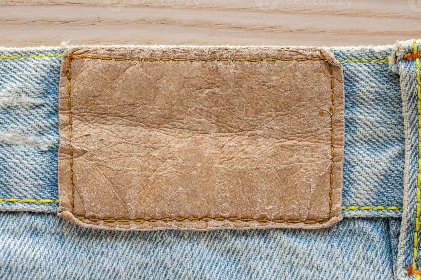Fondo de textura de etiqueta de cuero de jeans azul foto