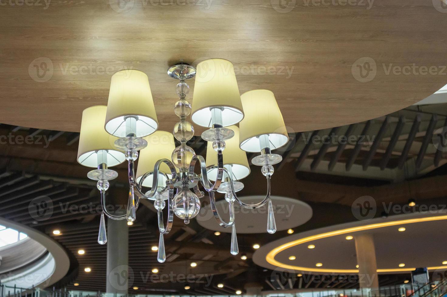 Chandelier hanging on the ceiling photo