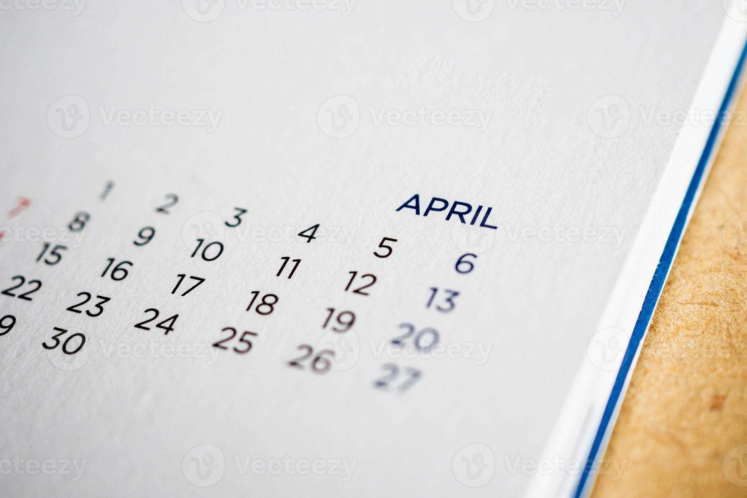 April calendar page with months and dates photo